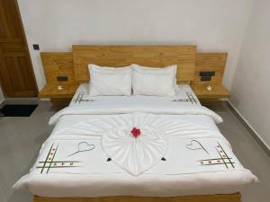 Postel nebo postele na pokoji v ubytování Dhonveli Inn, Bandidhoo
