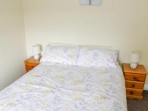 Postel nebo postele na pokoji v ubytování Glor Cottage