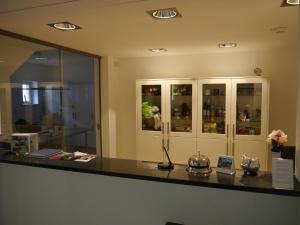 a counter in a room with a display case at Akzent Berghotel Rosstrappe in Thale