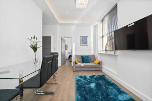 City Prime Apartments的电视和/或娱乐中心