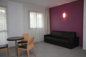 Posezení v ubytování Esatitude Hotel