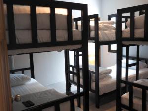 Postel nebo postele na pokoji v ubytování @HOsTEL PHANGAN