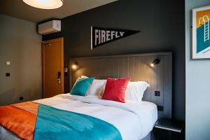 Posteľ alebo postele v izbe v ubytovaní Firefly