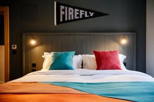 Posteľ alebo postele v izbe v ubytovaní Firefly