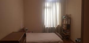 Rúm í herbergi á Grimis Villa