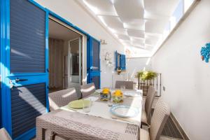 Posezení v ubytování Le Gioie - Dimora Brezza Marina - Confortevole e grazioso appartamento a due passi dalla spiaggia + 37 fotografií