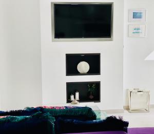 TV a/nebo společenská místnost v ubytování Canaryislandshost l Brisa del Atlántico