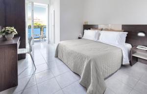 Posteľ alebo postele v izbe v ubytovaní Hotel Stacchini