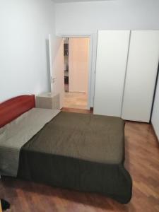 Postel nebo postele na pokoji v ubytování Apartman Sadutas