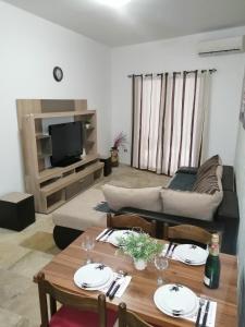 Posezení v ubytování Apartman Sadutas + 12 fotografií