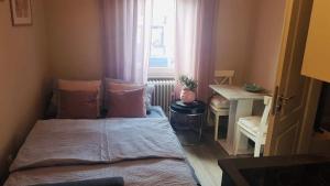 Postel nebo postele na pokoji v ubytování Villa Rosa Bad Camberg