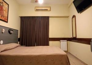 Postel nebo postele na pokoji v ubytování Hotel Nontue Abasto Buenos Aires