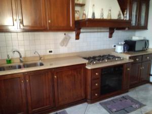 A kitchen or kitchenette at Villa Azalea