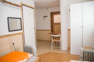 Postel nebo postele na pokoji v ubytování Apartmani Papeš