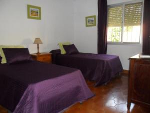 Posteľ alebo postele v izbe v ubytovaní Villas Aloha Valdelagrana