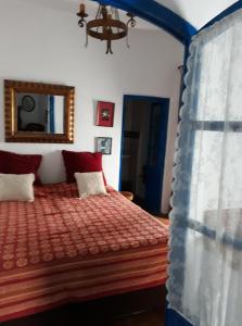 Posteľ alebo postele v izbe v ubytovaní Guesthouse La Tienda Cómpeta 21b