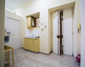 Kuchyň nebo kuchyňský kout v ubytování Binario176