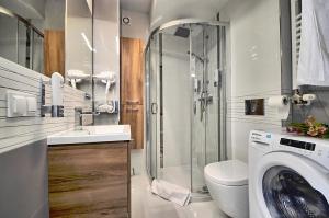 Kúpeľňa v ubytovaní Apartament Niebieski z tarasem