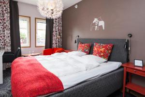 Postelja oz. postelje v sobi nastanitve Hotell Fridhemsgatan
