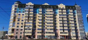 a large building with many windows at Lavina apartments in Sumy