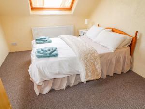 Łóżko lub łóżka w pokoju w obiekcie Mullaghderg Banks