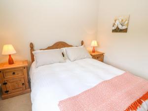 Łóżko lub łóżka w pokoju w obiekcie Sea View Hideaway