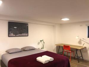 Postel nebo postele na pokoji v ubytování Hassan Guesthouse