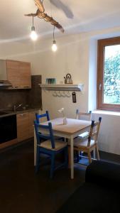 Kuchyň nebo kuchyňský kout v ubytování B&B Val Valerna