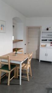 Kuchyň nebo kuchyňský kout v ubytování B&B Val Valerna