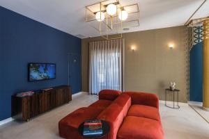 TV a/nebo společenská místnost v ubytování Best Western Plus Dimora del Monaco