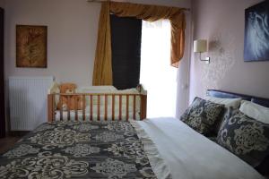 Posteľ alebo postele v izbe v ubytovaní Five stars in Trikala