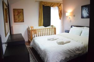 Posteľ alebo postele v izbe v ubytovaní Five stars in Trikala