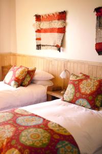 Postel nebo postele na pokoji v ubytování Hotel & Apart Hotel Monte Verde