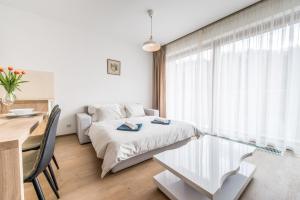 Postel nebo postele na pokoji v ubytování Mozart Central Apartments with garage
