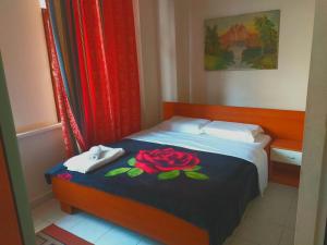 Postel nebo postele na pokoji v ubytování Hotel Central