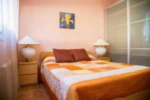 A bed or beds in a room at Casa Bella con piscina