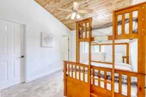 a bedroom with bunk beds and a ceiling fan at Skyline Serenity in South Lake Tahoe