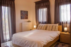 Posteľ alebo postele v izbe v ubytovaní Santo Villaggio - Unique Villa + 37 fotografií
