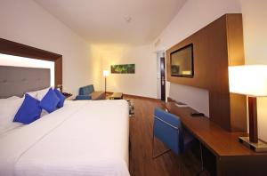 Ein Bett oder Betten in einem Zimmer der Unterkunft Novotel Panama City