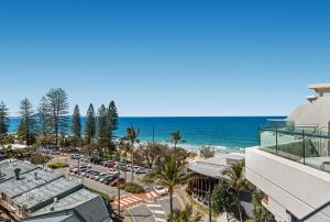 a view of the beach from a building at Sandcastles Mooloolaba in Mooloolaba