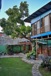 Zahrada ubytování Mangifera Hostel