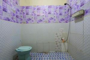 Koupelna v ubytování OYO 2497 Pesona Guest House