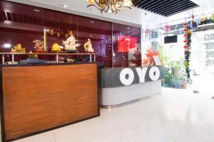 a store front with a wooden door in a mall at OYO 416 Lucky Hotel in Manila