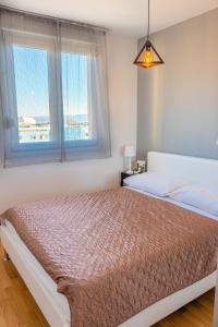 Posteľ alebo postele v izbe v ubytovaní Apartment Ante&Marijana