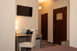 Kuchyňa alebo kuchynka v ubytovaní Hotel Maximum