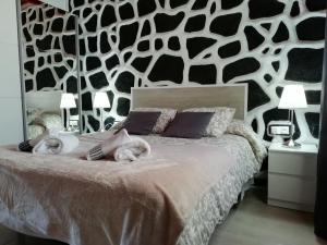 Posteľ alebo postele v izbe v ubytovaní Casa Gloria