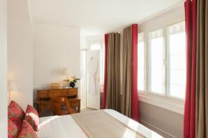 Cama o camas de una habitación en Hôtel Parc Saint-Séverin - Esprit de France