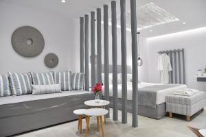 Postel nebo postele na pokoji v ubytování Crystal Mare Suites