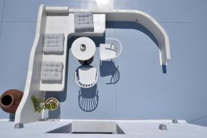 a kitchen sink with a faucet at Crystal Mare Suites in Naxos Chora