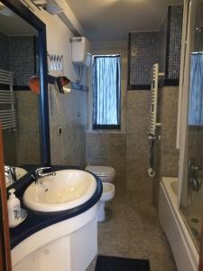 Ванна кімната в Colonna 9
